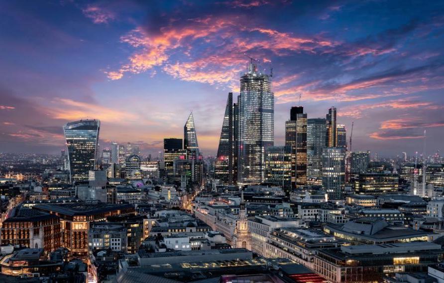 London skyline at dusk with purple sky